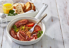 English breakfast with sausages, bacon and beans