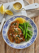 Pork escalope with horseradish crust and green beans