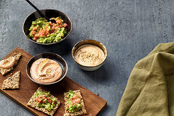 Guacamole and hummus with seed crisps