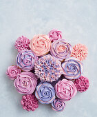 Cupcake arrangement with flower pattern, pastel colours