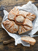 Mill bread on a rustic wooden table