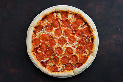 Pepperoni pizza with mozzarella and tomato sauce