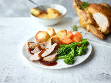 Roast chicken with roast potatoes and vegetables