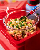 Pasta salad with ham, peas and cheese