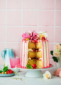 Festive sponge cake with buttercream and strawberries