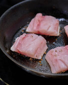 Pike cod fillets with pepper crust