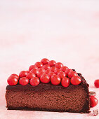 Chocolate orange cheesecake with red dragées