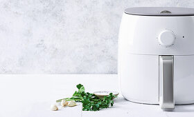 Hot air fryer with herbs and garlic