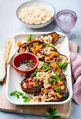 Baked aubergine with gremolata and couscous