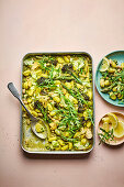 Gnocchi casserole with spring vegetables and pesto