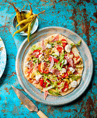 Pizza salad flatbread with chilli pepper