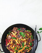 Thai drunken noodle wok with beef and vegetables