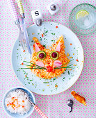 Tomato rice in the shape of a cat for children