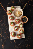 Crostini with Asian beef tartare and lime aioli