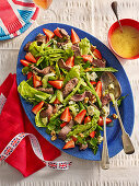 Royal Garden Salad with beef steak and strawberries