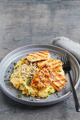 Grilled halloumi on lemon and dill polenta