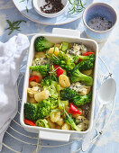 Baked gnocchi with broccoli, leek, peppers and blue cheese