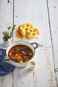 Tuscan beef stew with vegetables and olives