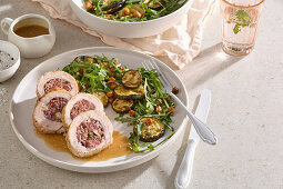 Turkey roulade with salsiccia filling and rocket and zucchini salad