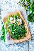 Zucchini pizza with asparagus and wild garlic