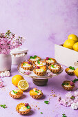 Mini lemon tartlets with raspberry and mint