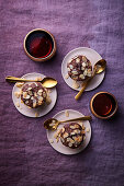 Chocolate tartlets with almond flakes