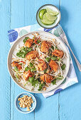 Salmon with bean sprouts, peanuts and chili