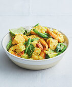 Kerala seafood curry with vegetables and lime