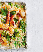 Creamy garlic and prawn pasta with peas