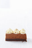 Chocolate mousse cake with Baileys and whipped cream topping