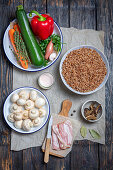 Ingredients for buckwheat with vegetables and bacon