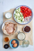 Ingredients for biryani with chicken and raisins