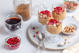 Mascarpone and coffee cream with nuts and pomegranate seeds