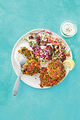 Spicy tuna and quinoa patties with coleslaw