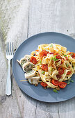 Tagliatelle mit gefüllten Calamari und Kirschtomaten