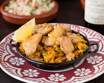 Paella mixta with chicken and seafood