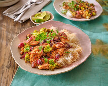 Chicken fricassee with rice noodles and vegetables