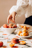 Fresh apricots and flat peaches