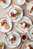 Rhubarb tart pieces with cream and strawberry sauce