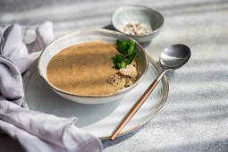 Cream of mushroom soup with parsley