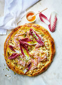 Pizza with radicchio, pistachios and mortadella