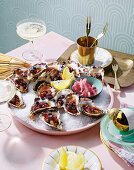 Fresh oysters à la Kilpatrick with chorizo, brandy and Tabasco