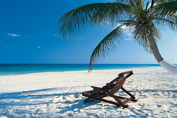 Deck chairs on Seven Mile Beach, Grand Cayman, Cayman Islands, Caribbean
