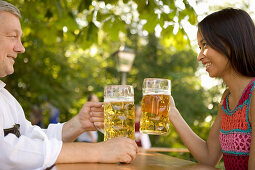 Man and woman in beergarden, Starnberger See Bavaria, Germany
