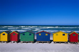 Colourful wooden beach huts along the beach, Muizenberg, South Africa
