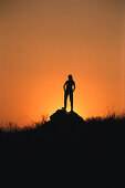 Woman watching Sundown, South, Afrika