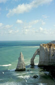 View of chalk cliffs on shore, Etretat Cliffs, Etretat, Normandy, France, Europe