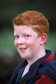 Boy grinning at camera, Murrisk, County Mayo, Ireland