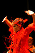 Woman in Red dancing Flamenco, World Flamenco Fair, Seville, Andalusia, Spain, Europe