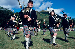 Bagpipe players at Glenfinnan Highland Games, Glen Coe valley, Invernesshire, Scotland, Great Britain, Europe